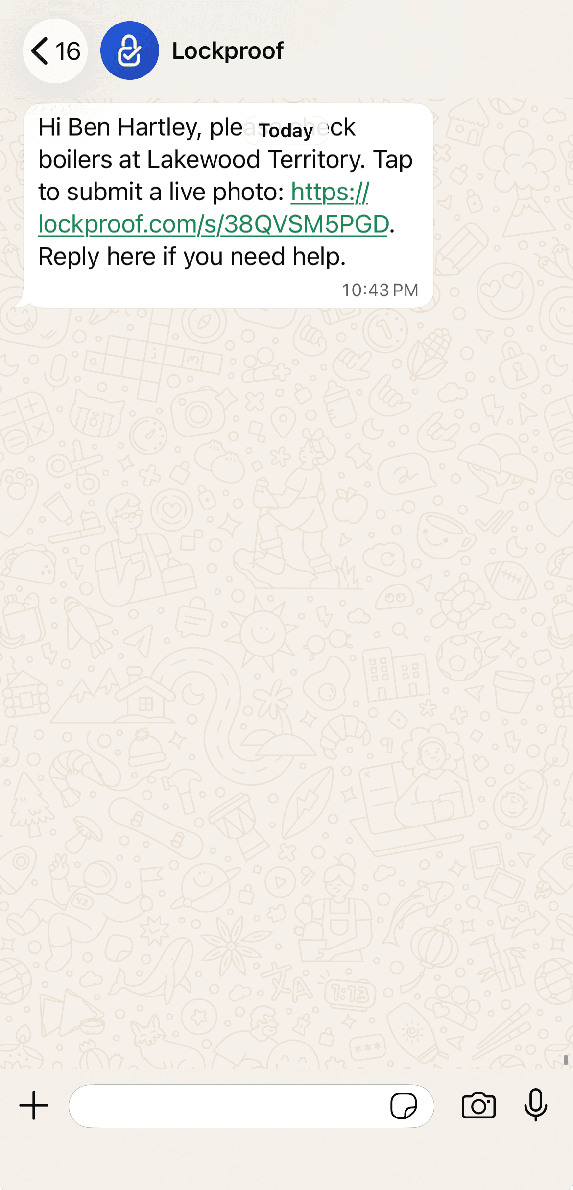 A worker’s phone showing the job arrive as a normal text message with one link